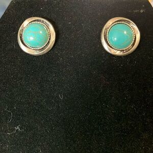 Turquoise colored and silver earrings.  Pierced. 3/4”